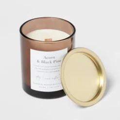 Clear Colored Glass With Woodwick And Brass Metal Inset Lid Acorn + Black Pine Candle Brown - Threshold™ -Decor Haven Shop GUEST e82cdb94 c293 4984 b5b6 1ca170680739